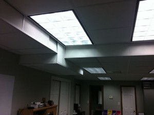 Overhead fluorescent lights in an office