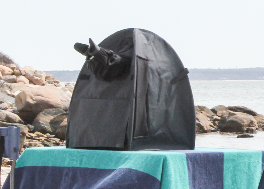 Stereo microscope set up on the beach, with the NIGHTSEA Eclipse MicroTent installed