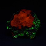 Roeblingite fluorescing under shortwave ultraviolet light