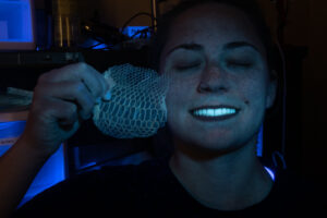 Fingernails, python skin, and teeth, UV light