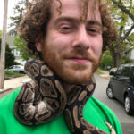 Nagini showing her owner Spencer some love