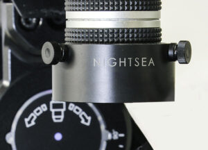 Filter mounted below objective